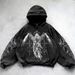 "Anime Streetwear Hoodie – Unisex Graphic Print Pullover With Oversized Fit (7 Sizes, Distressed Black)"_viptrois.com