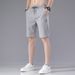 Men's Clothing Ice Silk Shorts Summer Loose Elastic Stitching Label Beach Five Point Shorts_viptrois.com