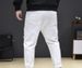 Large Size Men's Spring And Summer Ripped Jeans Men's Elastic Pure Black And White Jeans Men's Loose And Fat Plus Size Pants_viptrois.com