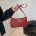 2025 New French Style Underarm High-End Niche Lychee Pattern Bow Bag Simple Versatile Shoulder Handbag_viptrois.com