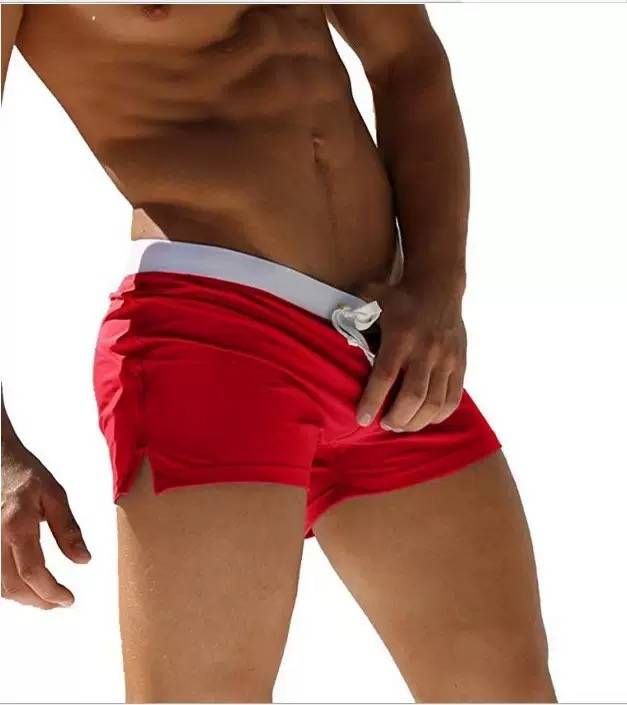 European And American Men's Solid Color Sexy And Fashionable Back Pocket Swimsuit Design Flat Corner Beach Pants Swimsuit Beach Breathable_viptrois.com
