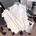 Men's Clothing Trendy Casual Sports Suit Men's Summer Loose Half Zip Short Sleeved Shorts Two Piece Suit_viptrois.com