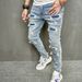 Man's clothing High street fashion ripped slim slim feet elastic jeans men slim fit_viptrois.com