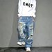 Men's Clothing Vibe High Street Personality Graffiti Loose Ripped Beggar Jeans Men's Niche Cool Wide Leg Trousers_viptrois.com