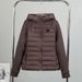 Women's Quilted Puffer Jacket with Silicone Triangle Print Hooded Short Coat Warm Outerwear for Petite Loose Fit Lightweight Winter_viptrois.com