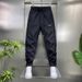 Men's Slim-Fit Casual Pants With Elastic Waist – Minimalist Embroidered Label & Stitching Detail (Black/White, M-3XL)_viptrois.com