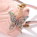 Colorful Diamond Studded Hollow Butterfly Metal Keychain Pendant Creative Small Gift Bag Pendant_viptrois.com