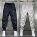 Men's Slim-Fit Casual Pants With Elastic Waist – Minimalist Embroidered Label & Stitching Detail (Black/White, M-3XL)_viptrois.com