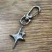 Ianworth Korean Metal Alloy Star Simple Pendant Keychain Bag Pendant Accessories Cross Border E Commerce_viptrois.com