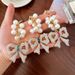 Handmade Series Pearl String Bow Shape Keychain Pendant Metal Diamond Bag Pendant Gift_viptrois.com