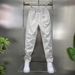 Men's Slim-Fit Casual Pants With Elastic Waist – Minimalist Embroidered Label & Stitching Detail (Black/White, M-3XL)_viptrois.com
