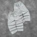 Men's Clothing 2025 European And American Men And Women Couples Same Loose Embroidered Double Pockets Exposed Line Sweatpants One Piece Wholesale_viptrois.com