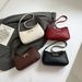 2025 New French Style Underarm High-End Niche Lychee Pattern Bow Bag Simple Versatile Shoulder Handbag_viptrois.com