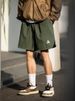 K Men's Loose Casual Shorts With A Curved Slit Design At The Hem And Embroidered Sporty Five Quarter Pants_viptrois.com