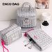 New Personalized Style Large Capacity Silver Cosmetic Bag Large Capacity Handheld Storage Bag High Grade Down Texture_viptrois.com