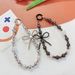 Light Luxury Style Electroplated Bow Inlaid Diamond Beads Mobile Phone Chain Student Bag Pendant_viptrois.com