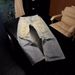 Men's Clothing Ac Style Ripped Yellow Mud Old Washed Dirty Pants Loose Flared Jeans For Men And Women_viptrois.com
