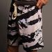 Men's foreign trade summer new men's fashion beach shorts hole cloth fabric multi-color sports four-quarter pants for men_viptrois.com