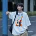 【DORAE】2026 Unisex T-shirt (100% Cotton) Black ("Champagne Celebration Penguin" Print & Playful Accent) – Casual Style For Friend Gathering_viptrois.com