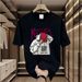【DORAE】2026 Unisex T-shirt (100% Cotton) Black ("KEEP IT REAL Hip-Hop Figure" Print & Playful Accent) – Casual Style For Friend Gathering_viptrois.com