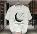 【DORAE】2026 Breathable T-shirt (Eco Cotton) Black (3D "Cosmic Moon & Spaceship" Print & White Accent) – Pioneer Style For Weekend Getaway_viptrois.com