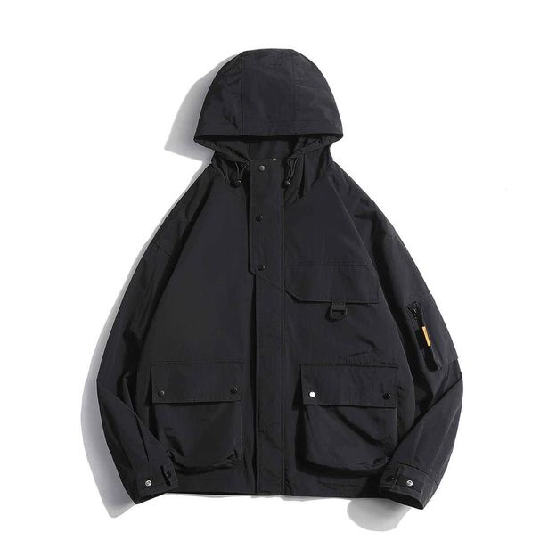 "Streetwear Utility Jacket – Unisex Nylon Cargo Coat With Detachable Hood For Urban Exploration"_viptrois.com