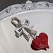 Bag Pendant A Simple And Elegant Bag Pendant With A Red Heart-shaped Metal Bow_viptrois.com