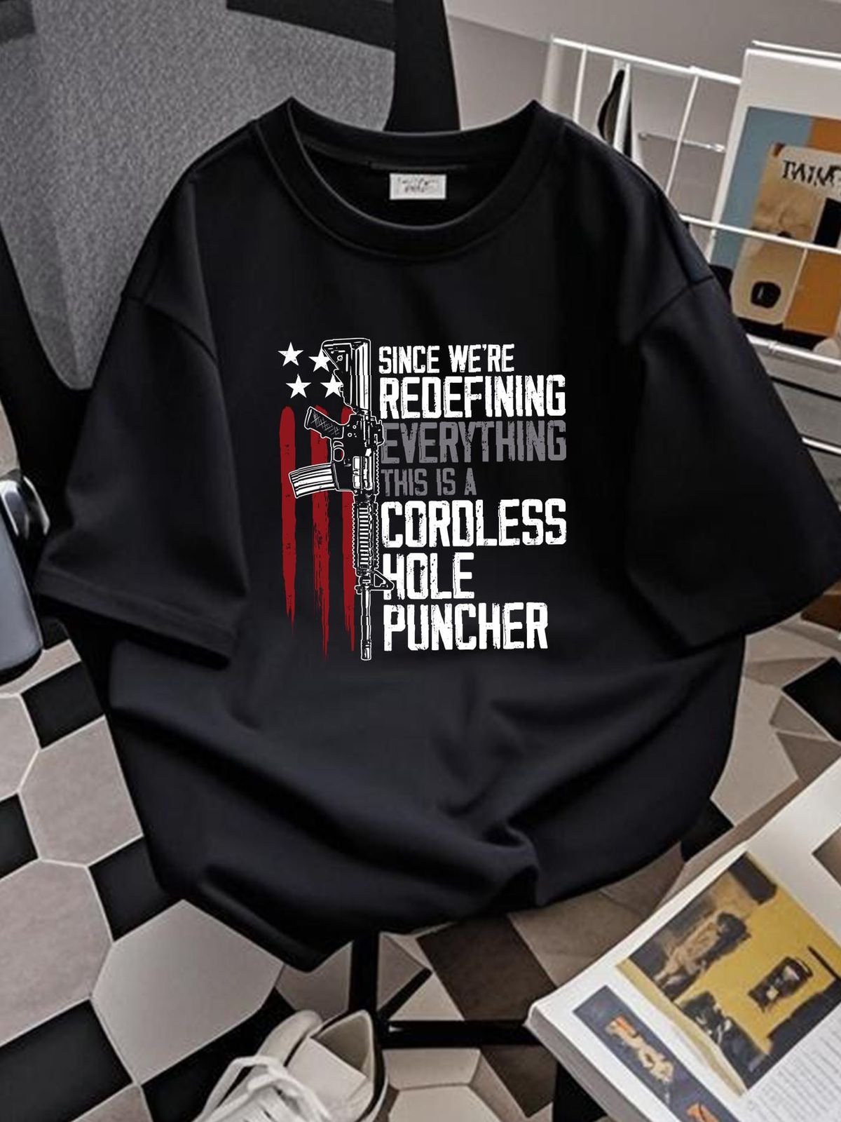 We're Redefining Everything This Is Cordless Hole Puncher Unisex T-Shirt Fashion Streetwear Homme Stretched Stylish Graphic Casual_viptrois.com
