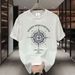 【DORAE】2026 Unisex T-shirt (100% Cotton) Black ("Pushed Aside Curtains Compass" Print & Playful Accent) – Casual Style For Friend Gathering_viptrois.com