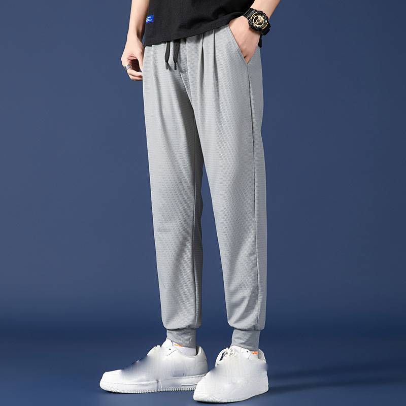Men's Clothing Ice Silk Pants Spring And Summer Loose Type Large Size Cuffs Sports Thin Breathable Nine Point Casual Pants_viptrois.com
