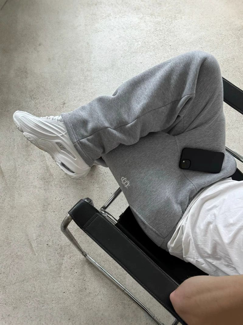 Unisex Retro Street Trend Hip Hop Casual Elastic Waist Zipper Loose Solid Color Sports Casual Pants_viptrois.com
