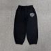 "Unisex Retro Streetwear Sweatpants – Printed Hip-Hop Couple Pants, Loose Fit & High Comfort (S-XL, Black/Gray)"_viptrois.com