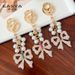 Handmade Series Pearl String Bow Shape Keychain Pendant Metal Diamond Bag Pendant Gift_viptrois.com