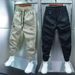 Teenage and guys little young men clothing pants solid color elastic splicing slim fitting pants trendy brand Korean version versatile harem pants_viptrois.com
