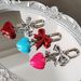 Bag Pendant A Simple And Elegant Bag Pendant With A Red Heart-shaped Metal Bow_viptrois.com