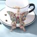 Colorful Diamond Studded Hollow Butterfly Metal Keychain Pendant Creative Small Gift Bag Pendant_viptrois.com