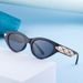 Cat's eye trendy street photos, UV resistant sunglasses, female sunglasses_viptrois.com