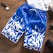Couple beach swimming quick drying pants, men's women's casual sports shorts, and shorts_viptrois.com