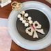 Handmade Series Pearl String Bow Shape Keychain Pendant Metal Diamond Bag Pendant Gift_viptrois.com