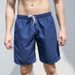 Men's Clothing Solid Color Quick Drying Beach Pants Men's Surf Shorts Loose Large Pants Casual Vacation Large Size Five Point Beach Shorts_viptrois.com