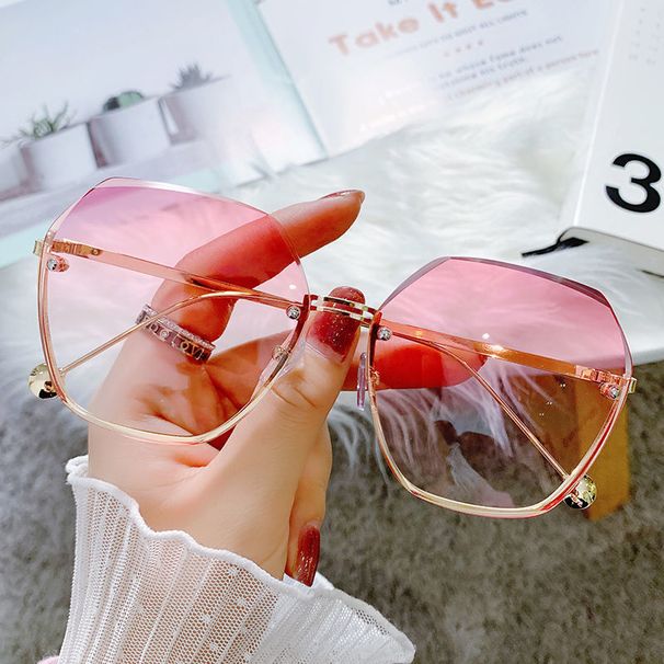2024 New frameless cut edge trendy slim face, fashionable and stylish sunglasses for women with UV protection_viptrois.com