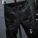 Men's Black new ripped patch jeans for men slim fit elastic small feet youth skull print fashion beggar pants_viptrois.com