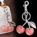 Bag Charm Factory Direct Sales Hot Selling Multi Color Cherry Lock Ring Fashion Personality Bag Fruit Pendant Accessories Jewelry Wholesale_viptrois.com
