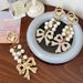 Handmade Series Pearl String Bow Shape Keychain Pendant Metal Diamond Bag Pendant Gift_viptrois.com