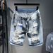 Men's Clothing Summer New Style Ripped Denim Shorts Men's Loose Five Point Shorts_viptrois.com