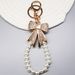 Diamond Bow Mobile Phone Chain Love Buckle Earphone Shell Decorative Pendant Jewelry Key Chain Pendant_viptrois.com
