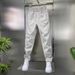 Men's Slim-Fit Casual Pants With Elastic Waist – Minimalist Embroidered Label & Stitching Detail (Black/White, M-3XL)_viptrois.com
