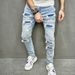 Man's clothing High street fashion ripped slim slim feet elastic jeans men slim fit_viptrois.com