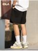 K Men's Loose Casual Shorts With A Curved Slit Design At The Hem And Embroidered Sporty Five Quarter Pants_viptrois.com