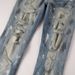 Man's clothing High Street vintage men's jeans Hipster street fashion slim-fit small feet ripped patch casual pants_viptrois.com